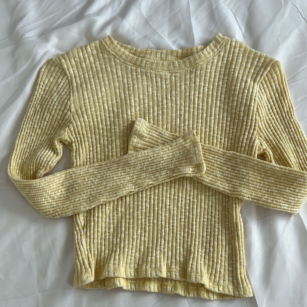 Yellow long sleeve, very warm, and comfortable material.